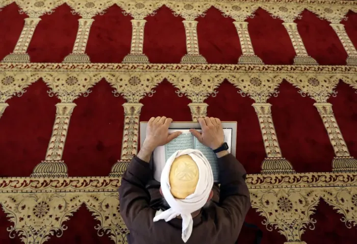 Framed Print : A Palestinian man reads the Koran in al-Aqsa Mosque, on the compound known to Muslims as Framed Print : A Palestinian man reads the Koran in al-Aqsa Mosque, on the compound known to Muslims as