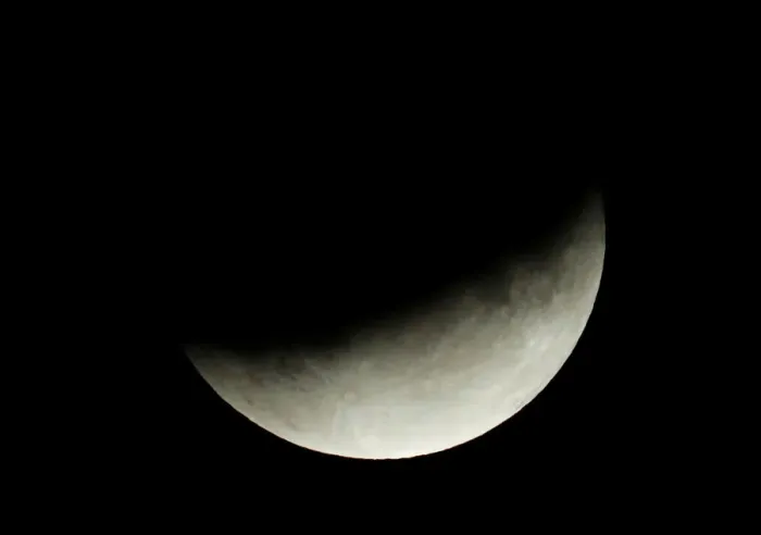 Framed Print : A partial lunar eclipse is seen in Berlin Framed Print : A partial lunar eclipse is seen in Berlin
