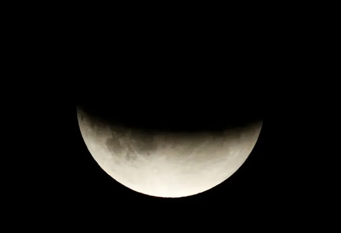 Framed Print : A partial lunar eclipse is seen in Berlin