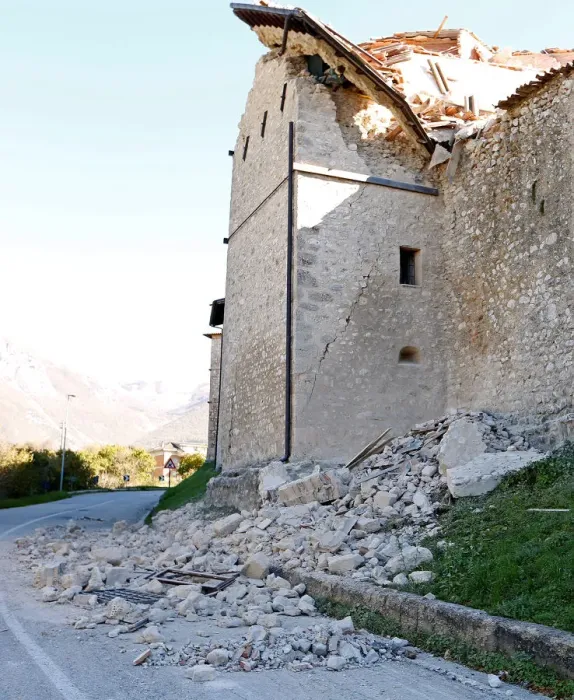 Framed Print : A partially collapsed building is seen following an earthquake in Norcia Framed Print : A partially collapsed building is seen following an earthquake in Norcia