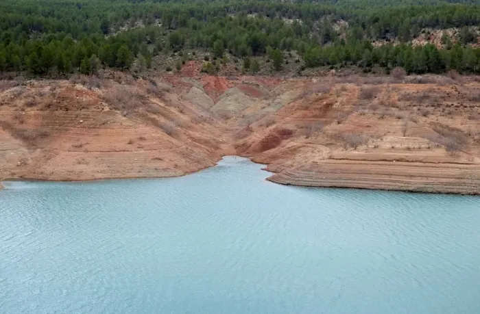 Framed Print : The partially empty Contreras water reservoir is pictured during a severe drought near Framed Print : The partially empty Contreras water reservoir is pictured during a severe drought near
