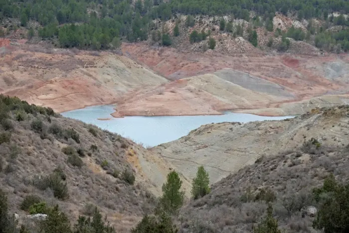Framed Print : The partially empty Contreras water reservoir is pictured during a severe drought near Framed Print : The partially empty Contreras water reservoir is pictured during a severe drought near