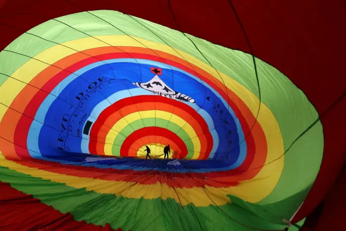 Framed Print : Participants prepare a balloon for inflation during the International Hot Air Balloon Framed Print : Participants prepare a balloon for inflation during the International Hot Air Balloon