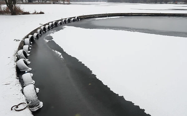 Partly frozen Svisloch river is seen in Minsk