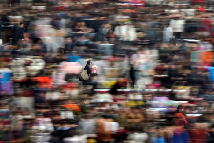 Framed Print : Passengers wait to board trains at Shanghais Hongqiao Railway Station as the annual