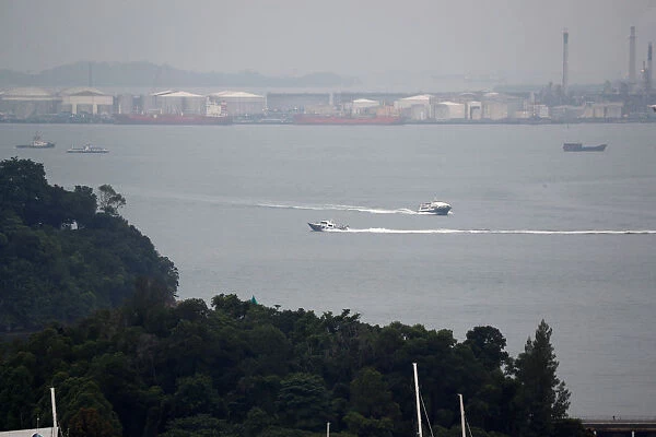 Patrol boats are seen in waters near Sentosa island, Singapore