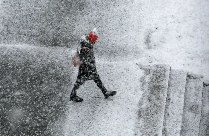 Framed Print : A pedestrian walks during a heavy snowfall in the Siberian town of Divnogorsk Framed Print : A pedestrian walks during a heavy snowfall in the Siberian town of Divnogorsk