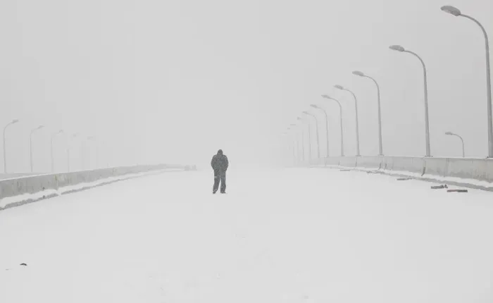 Framed Print : Pedestrian walks during snowfall in Shanghai Framed Print : Pedestrian walks during snowfall in Shanghai