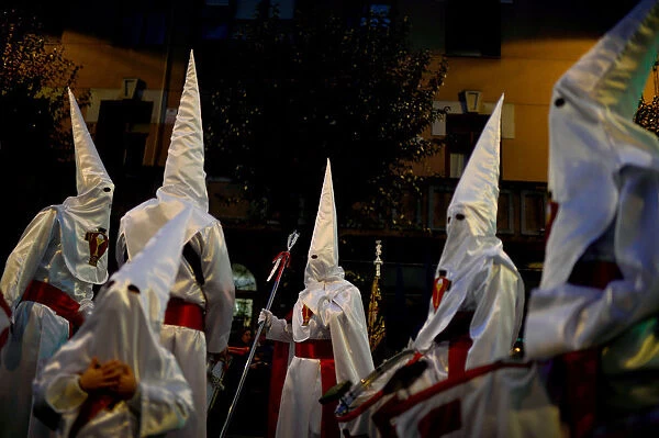 Penitents take part in the Procession del Nazareno in Bilbao