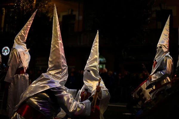 Penitents take part in the Procession del Nazareno in Bilbao