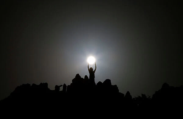 People celebrate the summer solstice at the Kokino megalithic observatory near the city