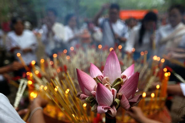 People pray at the Oudong mountain during the annual Makha Bucha Day which celebrates