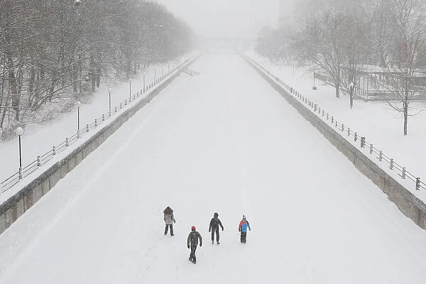 People skate on the Rideau Canal in Ottawa