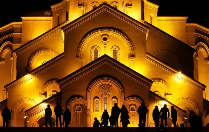Framed Print : People walk in front of the Holy Trinity cathedral a midnight Christmas service in Framed Print : People walk in front of the Holy Trinity cathedral a midnight Christmas service in
