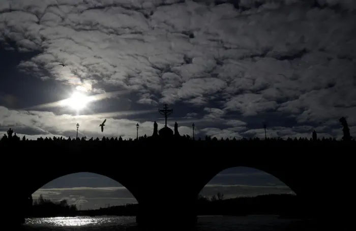 Framed Print : People walk across the medieval Charles Bridge in Prague Framed Print : People walk across the medieval Charles Bridge in Prague