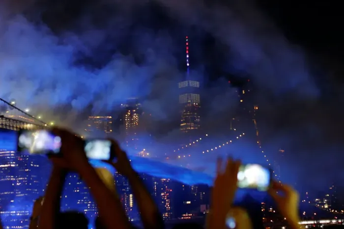 Framed Print : People watch the Macys 4th of July Firework Show over the Brooklyn Bridge in New York Framed Print : People watch the Macys 4th of July Firework Show over the Brooklyn Bridge in New York