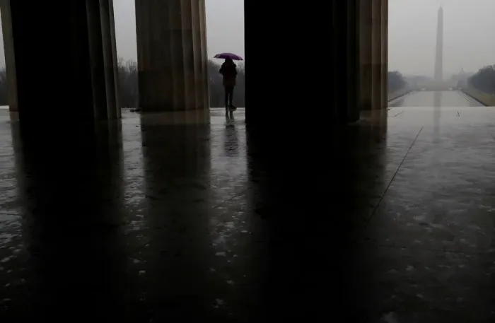 Framed Print : A person stands at the steps of the Lincoln Memorial in Washington Framed Print : A person stands at the steps of the Lincoln Memorial in Washington