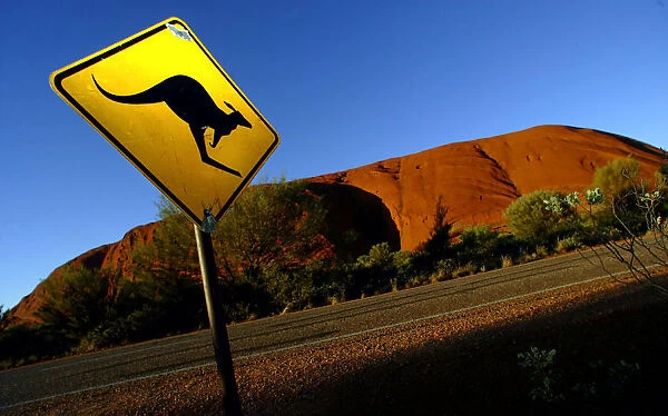 PHOTO TAKEN 20APR04- A road sign near Uluru (Ayers Rock), about 350 kilometres (220