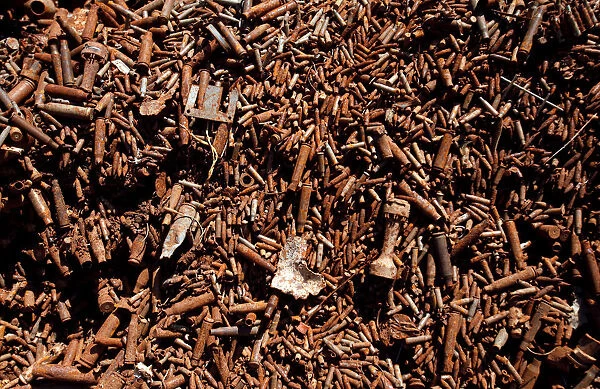 A pile of recyclable bullet casings used for the production of copper wires is seen at a