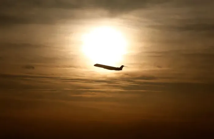 Framed Print : A plane is seen during sunrise at the international airport in Munich Framed Print : A plane is seen during sunrise at the international airport in Munich