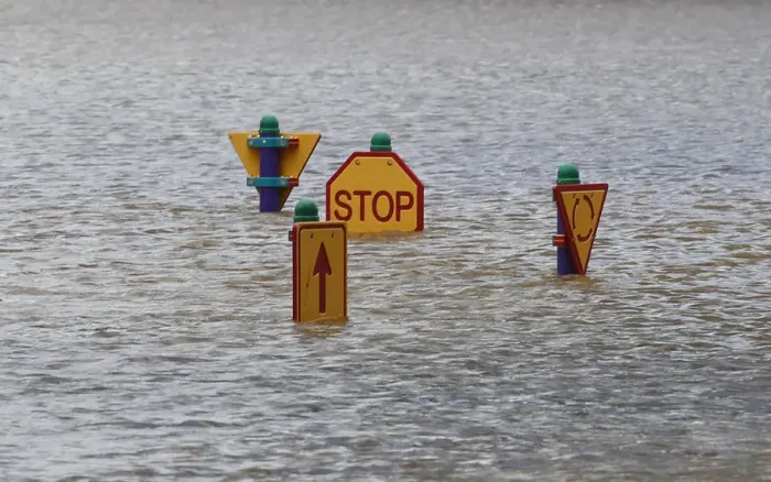 Framed Print : A play ground affected by flooded waters is seen in Bundaberg, Queensland