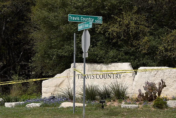 Police lines are seen blocking off part of Republic of Texas Boulevard following an