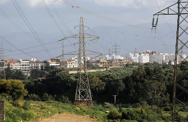 Power lines connecting pylons of high-tension electricity are seen in Algiers