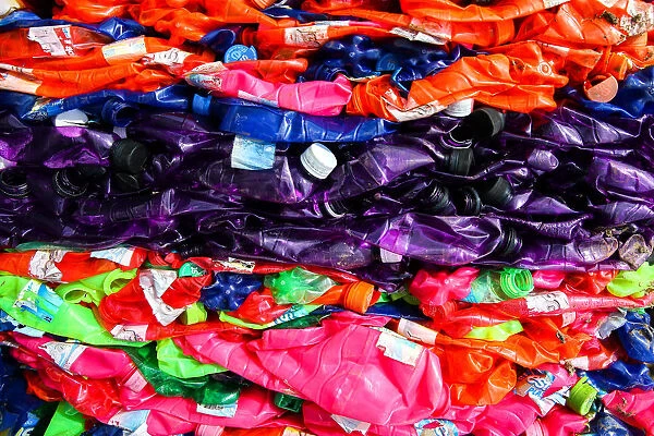 Pressed plastic waste ready for loading is seen at the Prabkaya Recycle Factory in