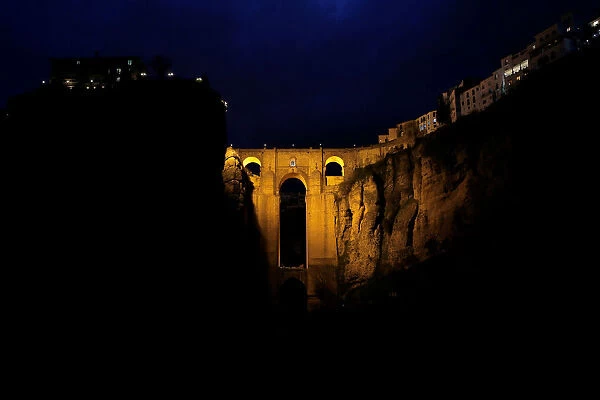 The Puente Nuevo (New Bridge) is seen before the Earth Hour in Ronda