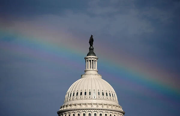A rainbow shines over the U. S. Capitol in Washington