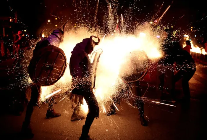 Framed Print : Revellers dressed as devils walk among fireworks during Correfocs in Palma de Mallorca Framed Print : Revellers dressed as devils walk among fireworks during Correfocs in Palma de Mallorca