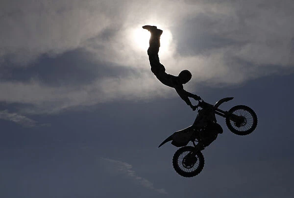 A rider performs on his motorcycle during FMX Jam, a freestyle motocross event, in Prague