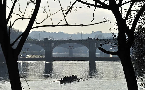Rowers train on the River Thames early in the morning at Richmond Lock in west London