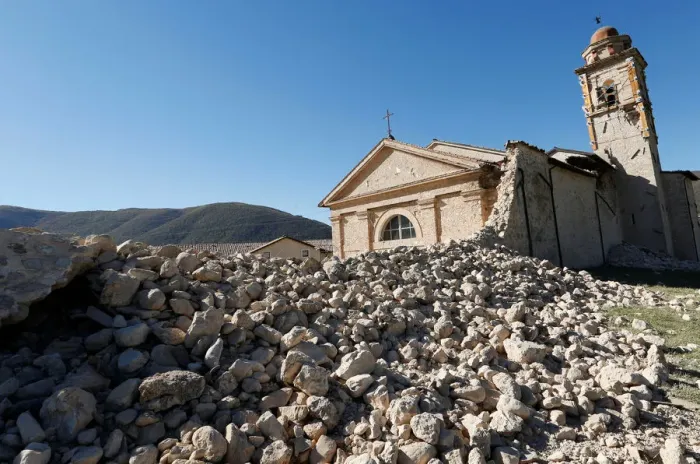 Framed Print : Saint Anthony church is seen partially collapsed following an earthquake along the road Framed Print : Saint Anthony church is seen partially collapsed following an earthquake along the road