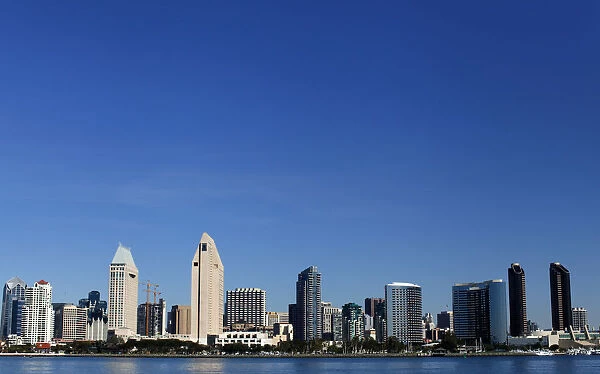 The San Diego skyline is seen from a beach in Coronado, California