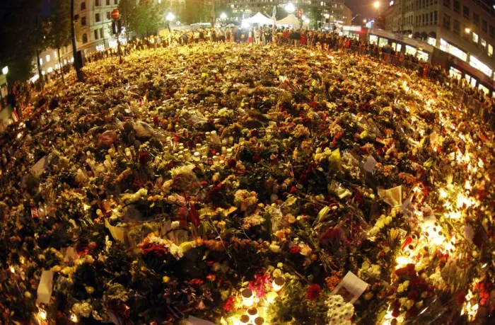 Framed Print : A sea of flowers and lit candles are placed in memory of those killed in Fridays bomb Framed Print : A sea of flowers and lit candles are placed in memory of those killed in Fridays bomb