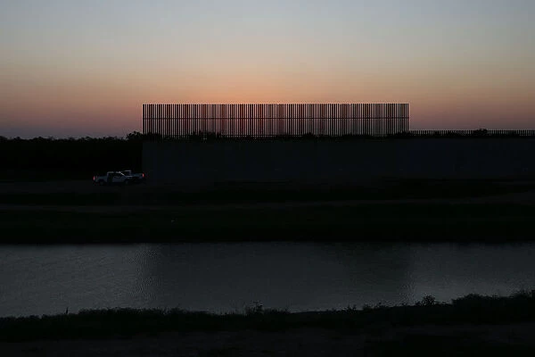 A section of border fence by the Mexico-U. S. border is pictured near McAllen