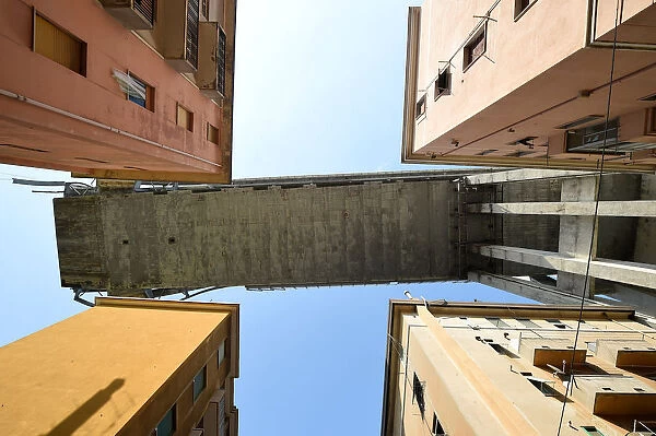 Section of the collapsed Morandi Bridge is seen above from the red zone in Genoa