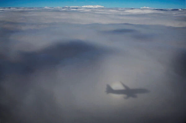 Shadow of Aeroflot Airbus A320 aircraft is seen on clouds