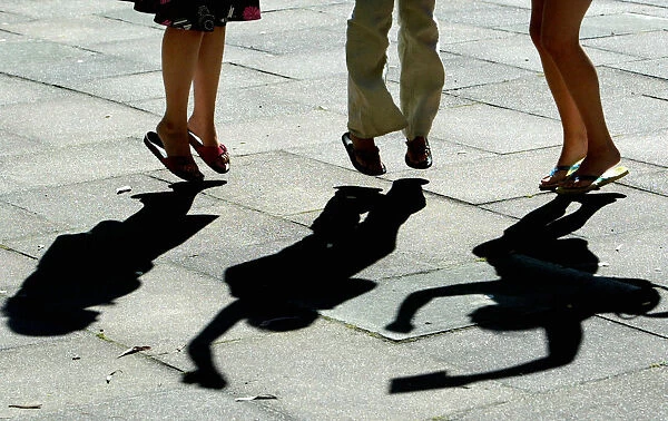 SHADOWS ARE CAST AS PUPILS CELEBRATE THEIR A-LEVEL EXAM RESULTS IN LONDON