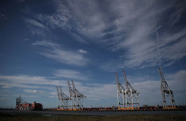 Shipping containers stacked on a cargo ship are seen in the dock at the ABP port in