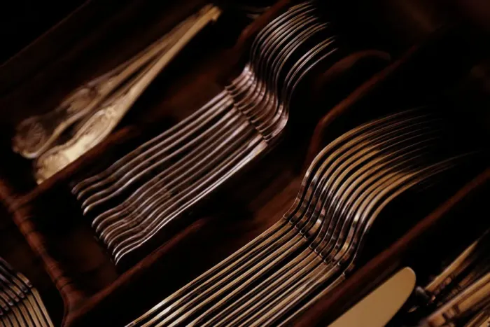 Framed Print : Silver cutlery is seen stored in a drawer at a private home in Valletta