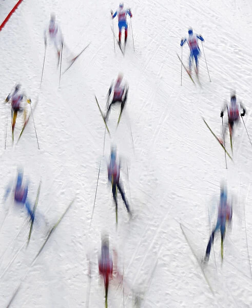 Skiers compete during the mens team sprint cross-country skiing World Cup at the Sprint
