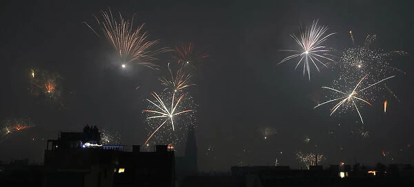 The sky over Vienna is illuminated by fireworks during New Year celebrations