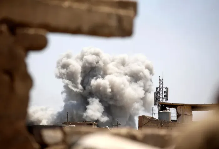 Framed Print : Smoke billows at the position of the Islamic State militants after it was hit by a rocket Framed Print : Smoke billows at the position of the Islamic State militants after it was hit by a rocket