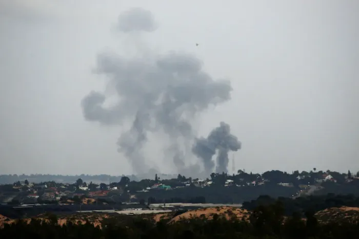 Framed Print : Smoke rises following an Israeli air strike on the Gaza Strip as seen from the Israeli Framed Print : Smoke rises following an Israeli air strike on the Gaza Strip as seen from the Israeli