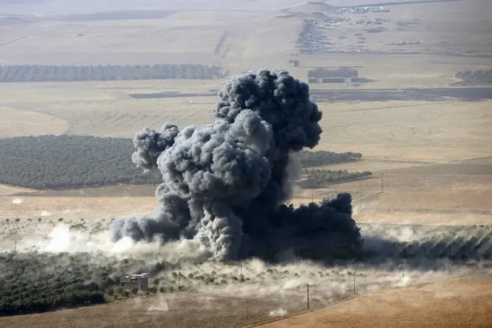 Framed Print : Smoke rises at Islamic State militants positions in the town of Naweran Framed Print : Smoke rises at Islamic State militants positions in the town of Naweran