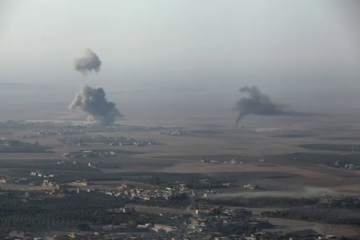 Framed Print : Smoke rises at Islamic State militants positions in the town of Naweran Framed Print : Smoke rises at Islamic State militants positions in the town of Naweran