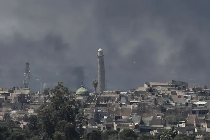 Framed Print : A smoke rises above the old city as Iraqi forces fight Islamic State militants in Mosul Framed Print : A smoke rises above the old city as Iraqi forces fight Islamic State militants in Mosul