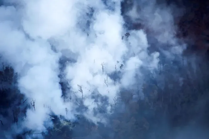 Framed Print : Smoke and steam rise from fissures near the Leilani Estates subdivision during ongoing